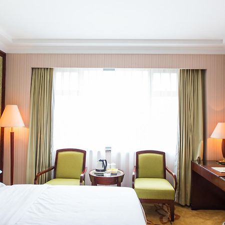 Vienna International Hotel Shanghai Train Station Экстерьер фото