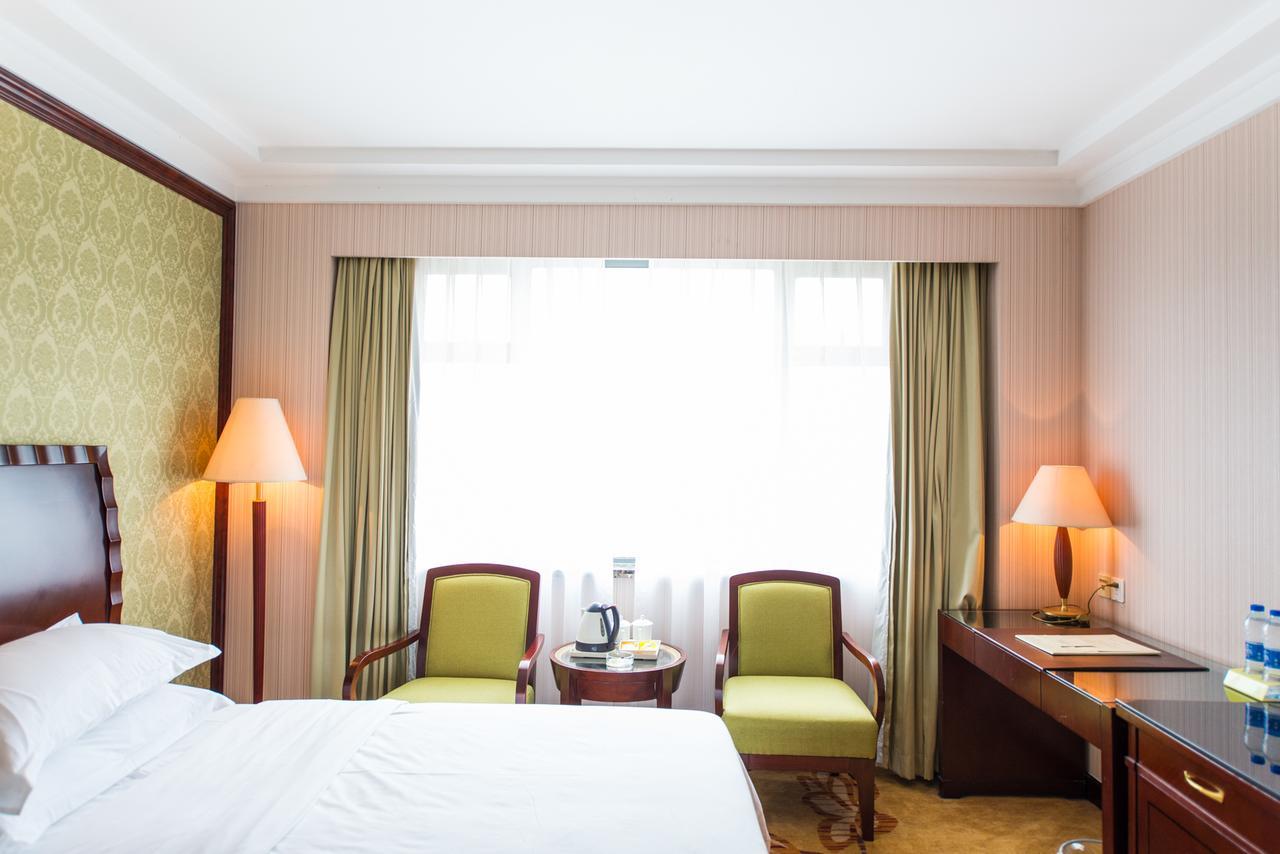 Vienna International Hotel Shanghai Train Station Экстерьер фото