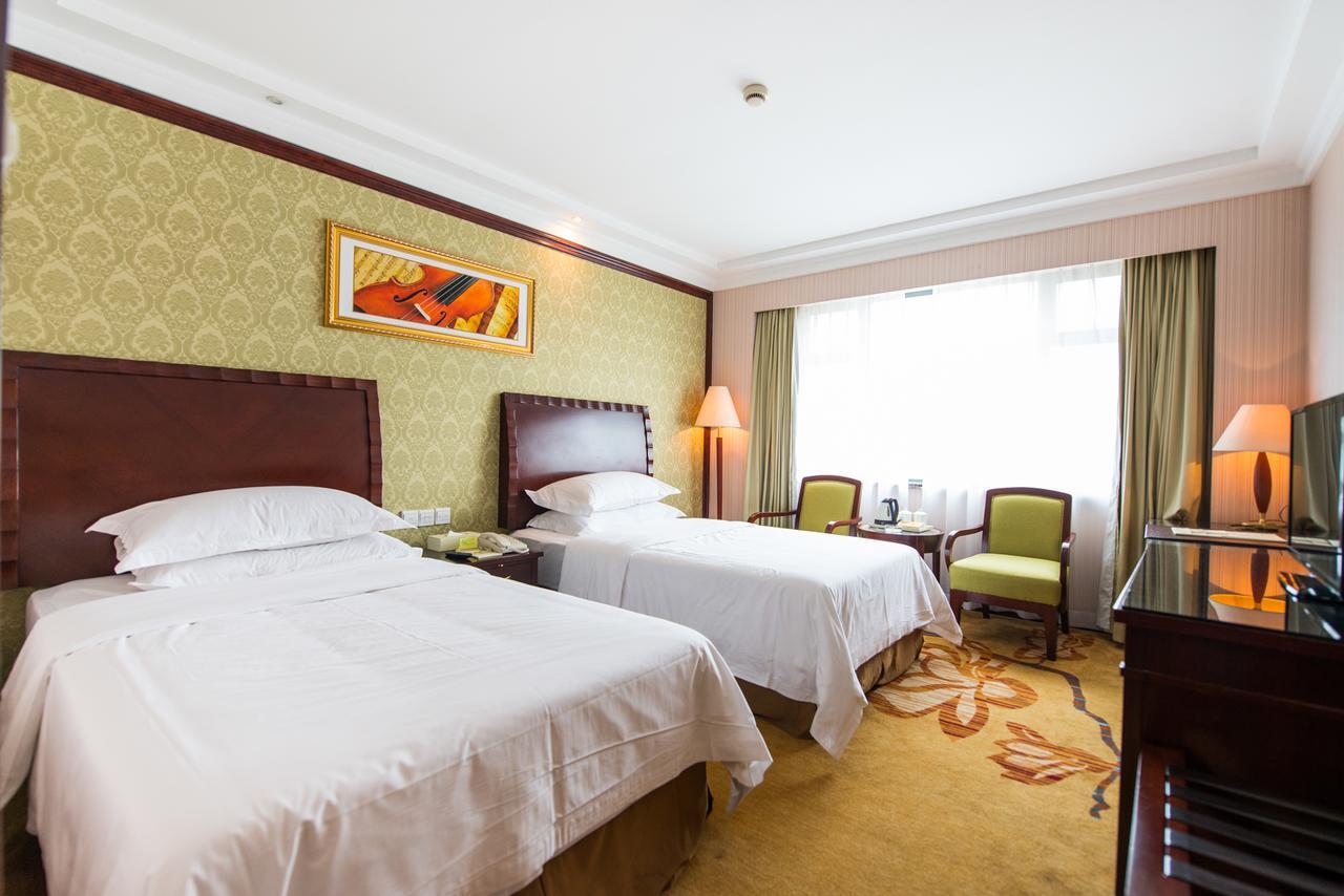 Vienna International Hotel Shanghai Train Station Экстерьер фото
