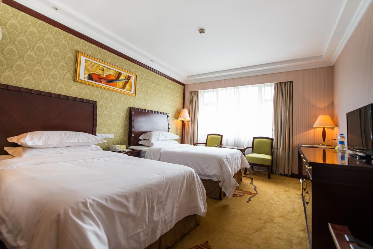Vienna International Hotel Shanghai Train Station Экстерьер фото