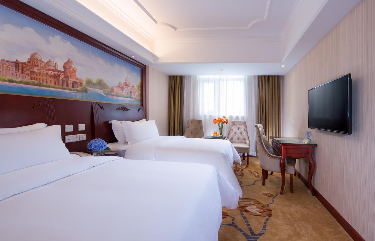 Vienna International Hotel Shanghai Train Station Экстерьер фото